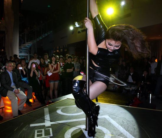 Pole dancing shakes off ill repute in China