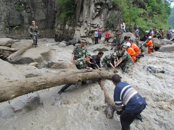 Mudslides force evacuation of 679 in SW China