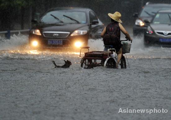 Heavy rains inundate SW China