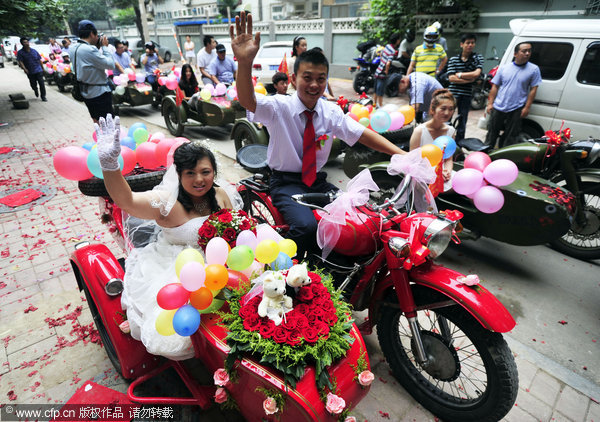 The blushing bride on a motorbike