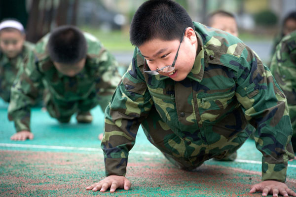 Summer military training toughens up students