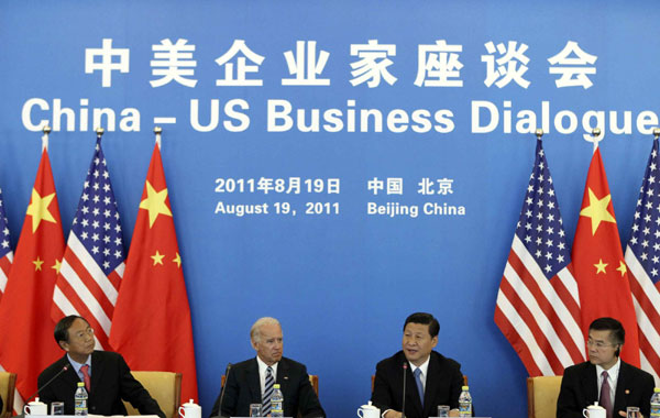 Xi, Biden talks business issues in Beijing