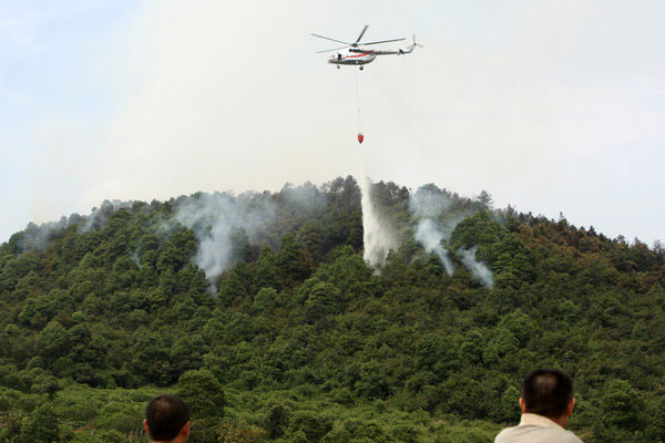 Wildfire burns in SW China