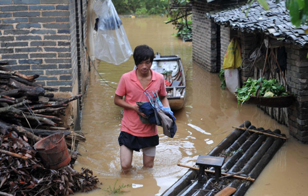 Typhoon-triggered floods kill at least 4