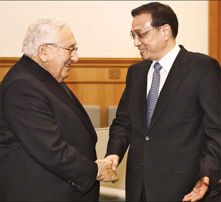 Li urges cooperation in meeting with Kissinger