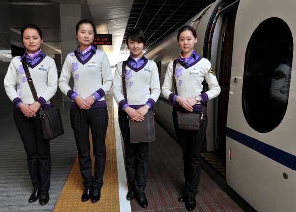 Bullet train stewardesses put on new uniforms