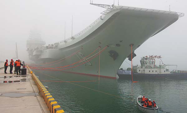 China's aircraft carrier docks at Qingdao