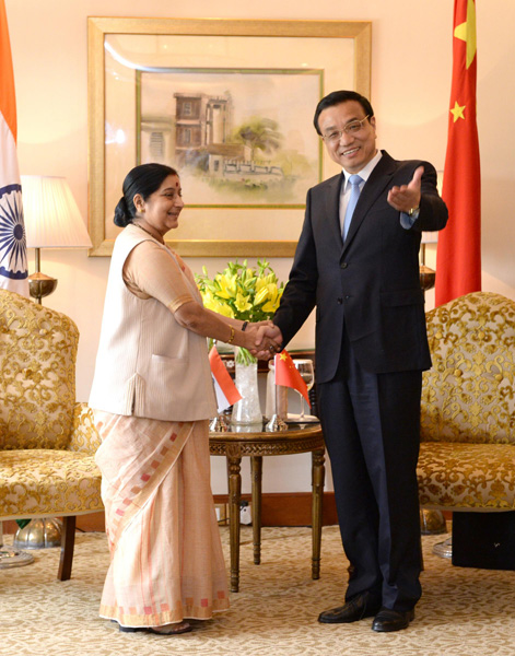 Li calls for more political exchanges with India