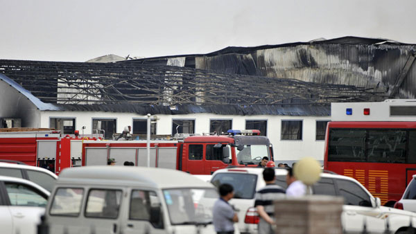 Workshop fire kills at least 119