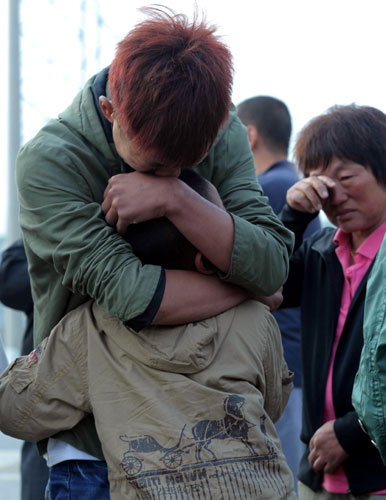 Families cling to fading hopes of finding survivors