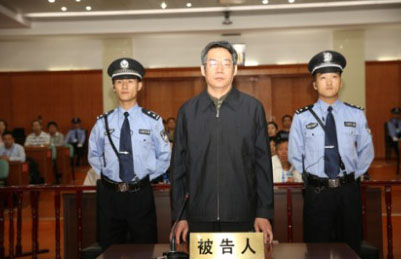 Ex-Chinese planning official on trial for graft
