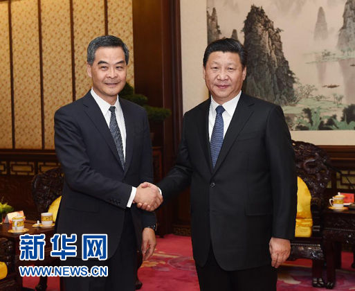 Xi gives full backing to HK system