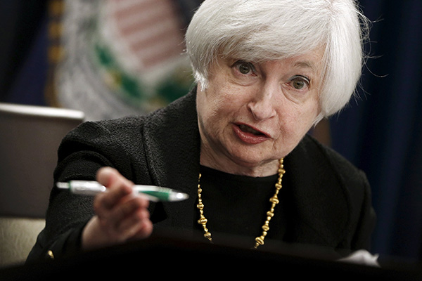 Global economy worries prompt Fed to hold rates steady