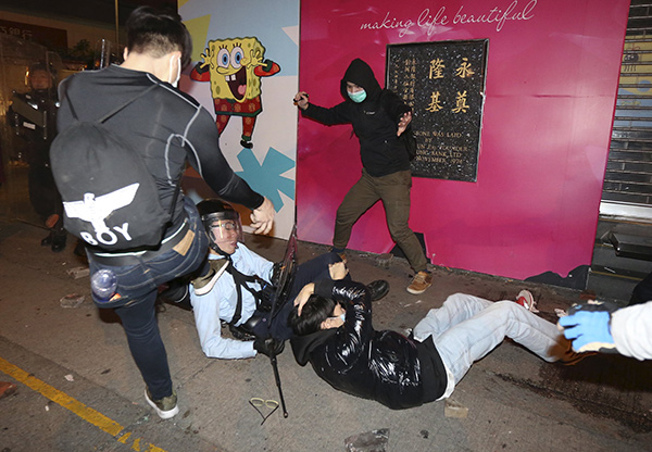 Hong Kong overnight riot injures at least 48 police officers