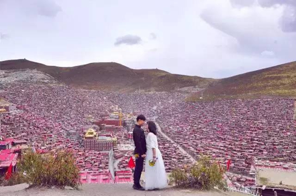 Couple on epic wedding trip to don 56 ethnic costumes