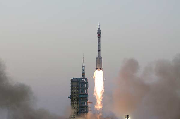 China launches manned spacecraft