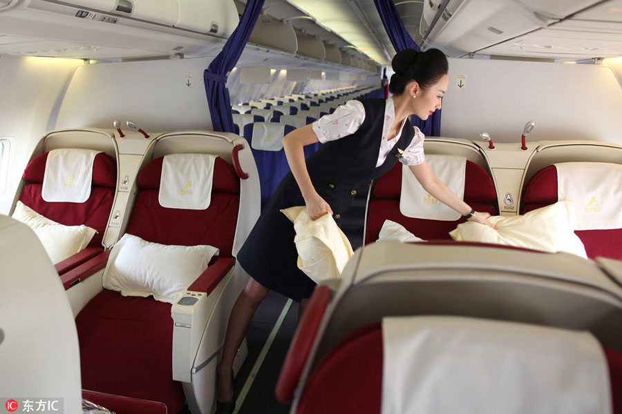 World's most beautiful stewardess: Serving passengers with smile