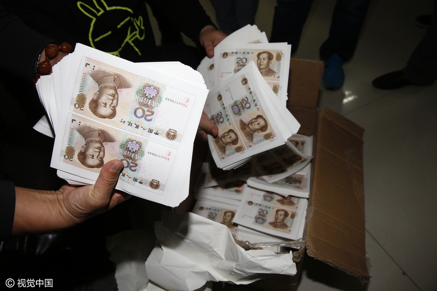 Gang busted for making and selling fake 20-yuan bank notes