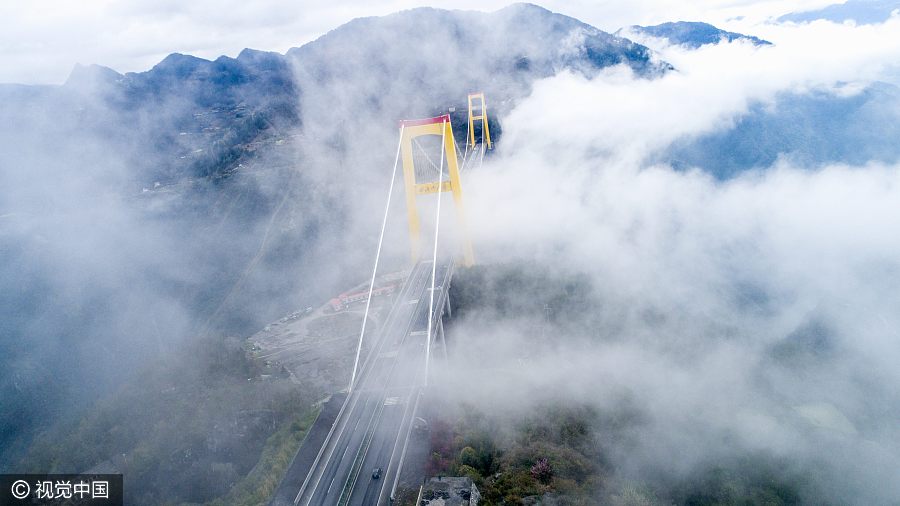 Mystical foggy view of Sidu River Bridge in Central China
