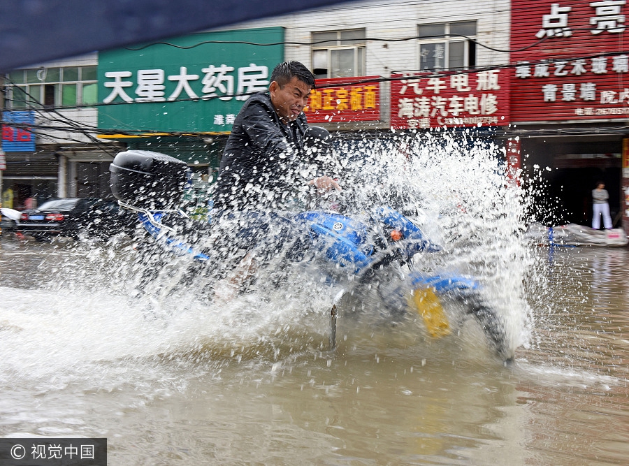 Torrential rain sweeps southern China