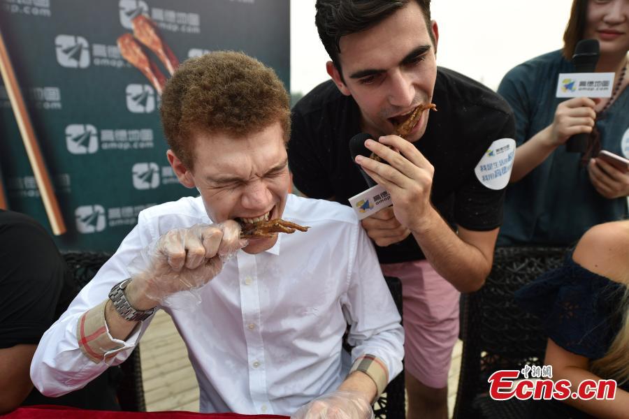 Foreigners take on challenge of wacky Chinese snacks