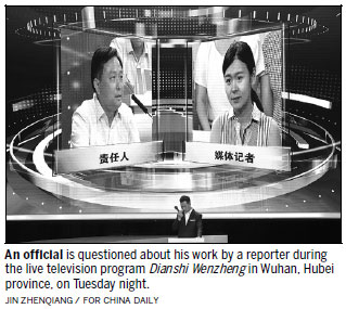 Officials questioned on Wuhan TV show