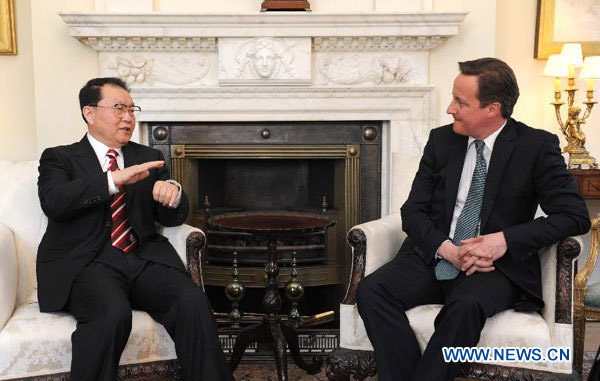 Senior CPC official meets British PM on ties
