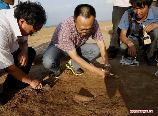 Terracotta portrait discovered in N China's prehistoric site