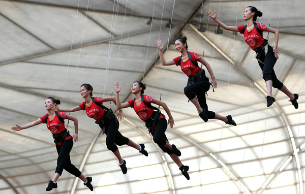 Acrobats set to fly through Bird's Nest in big autumn show
