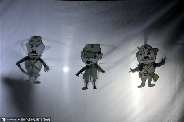 Students use puppetry to show Nanjing Massacre