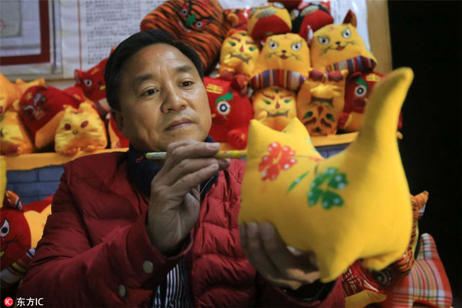 A craftsman's passion for creating cloth tigers