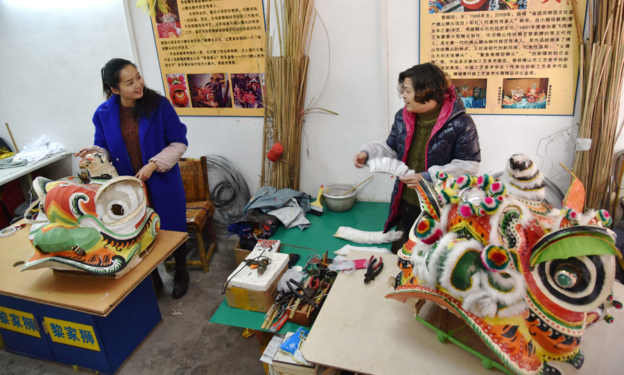 Mother and daughter: Generations of 'lion head' makers