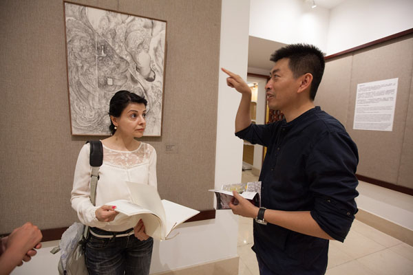 Blending East and West: Chinese artist's paintings shown in Malta