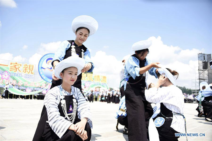Bouyei ethnic group hold headscarves contest in SW China's Guizhou