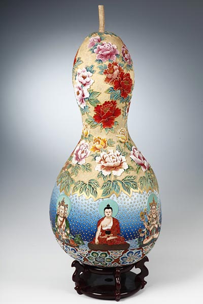 Exhibition showcases ancient art carved on gourds
