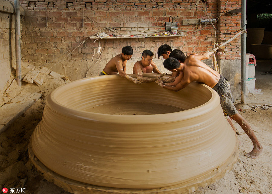 Sweat and clay: Process of making Jingdezhen's porcelain