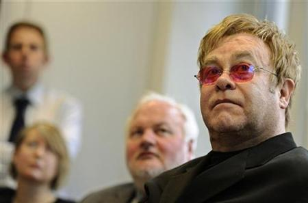 Elton John does not expect invite to royal wedding