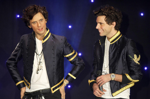 British singer Mika poses with his wax statue