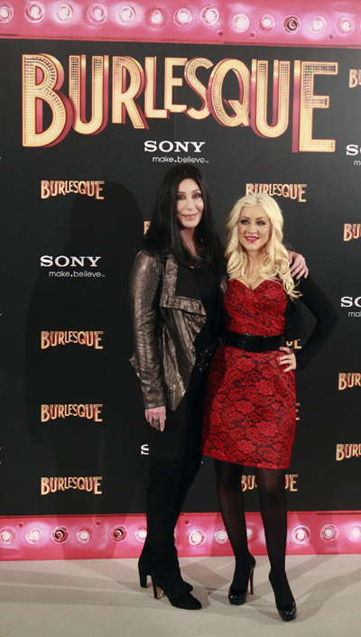 Cast memebers pose during the photocall of the movie 'Burlesque'