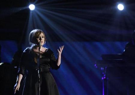 Adele ties Beatles record on U.K. charts