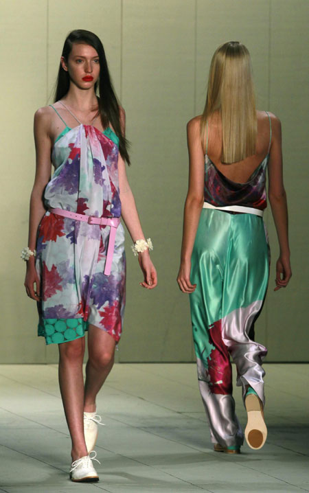 Models present creations from the Teca collection during Fashion Rio Summer 2012