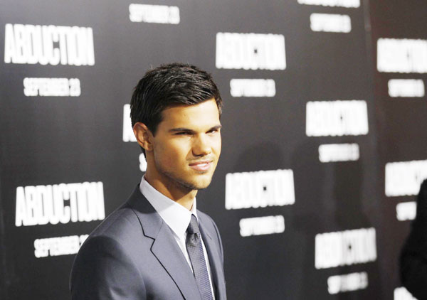 Taylor Lautner attends 'Abduction' world premiere
