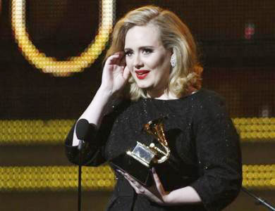 Adele wins three early Grammys