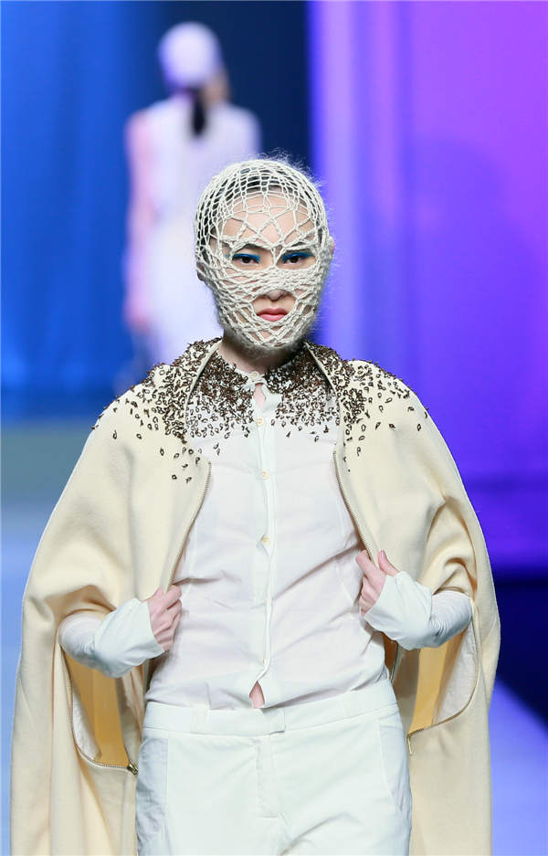 Designers present creations at China Fashion Week<BR>