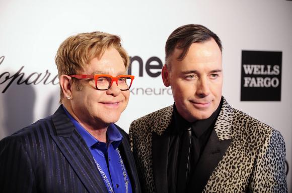 Elton John to marry partner as Britain legalizes gay marriage
