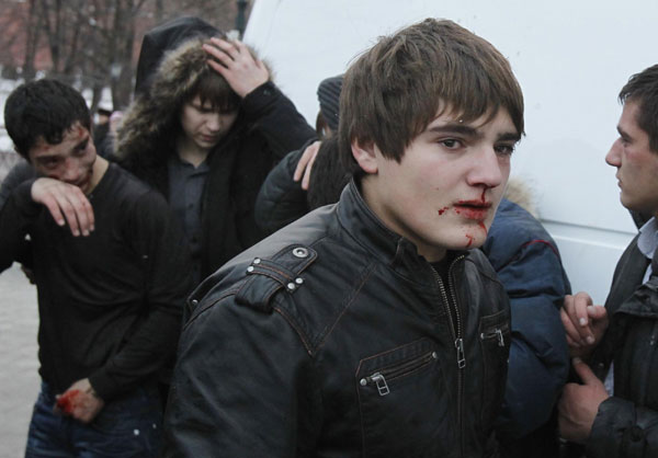 Football fans, anti-riot police clash in Moscow