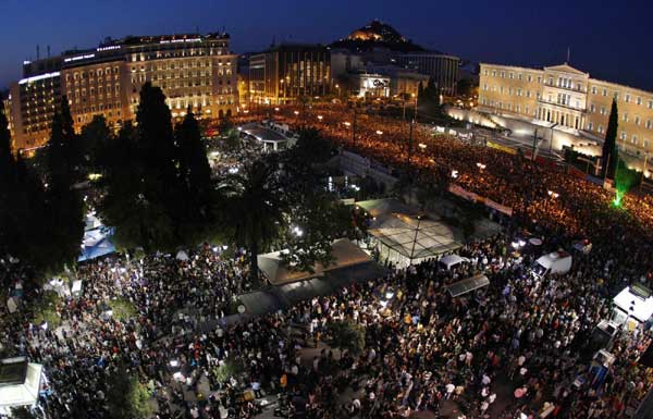 EU, IMF expected to judge Greece as protests swell