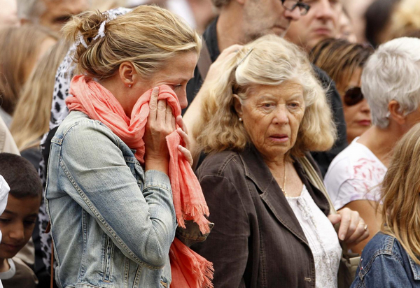 Norwegians mourn massacre victims in silence