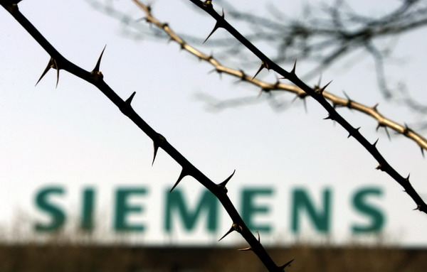 Siemens profit drops to $719 million