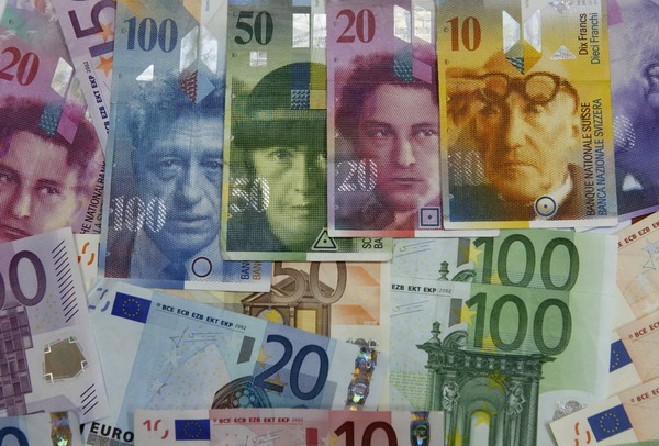 EU urges bailout changes as stocks, euro tumble